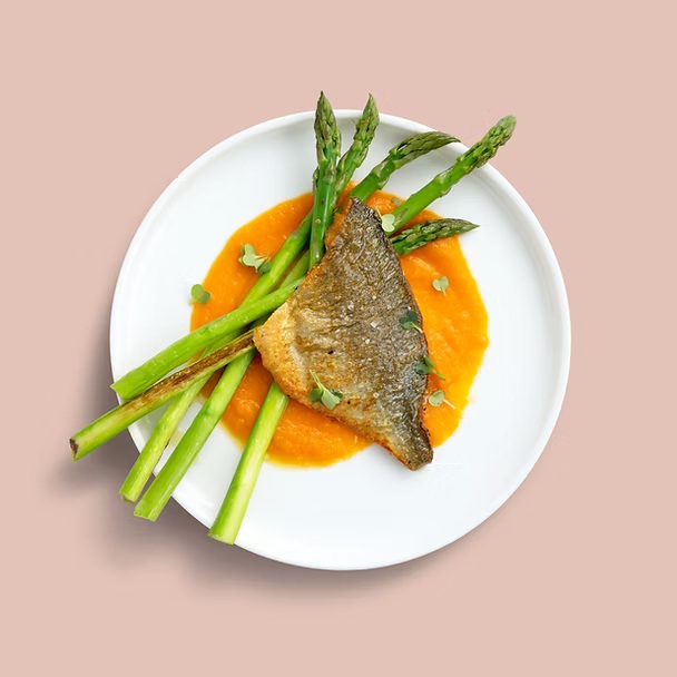 Fresh catch of the day with asparagus and sweet potato cream