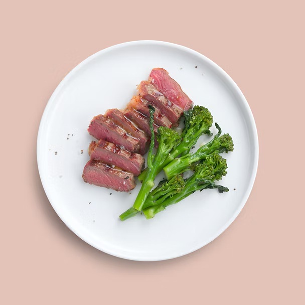 Peanut crusted steak with steamed vegetables