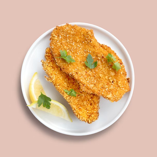 Schnitzel in a herb and parmesan crumb